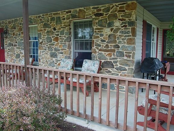Hand picked Stone Wrap Around Front Porch
