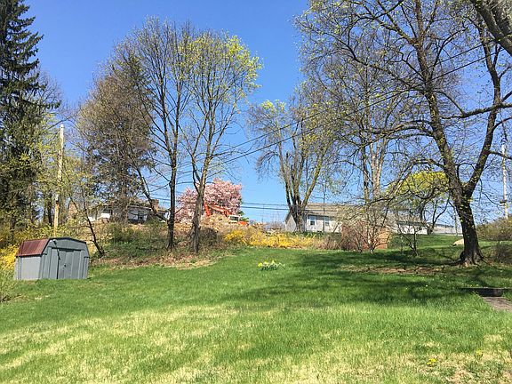 Spacious backyard with shed for extra storage. Serviced lawn mowing available upon request.