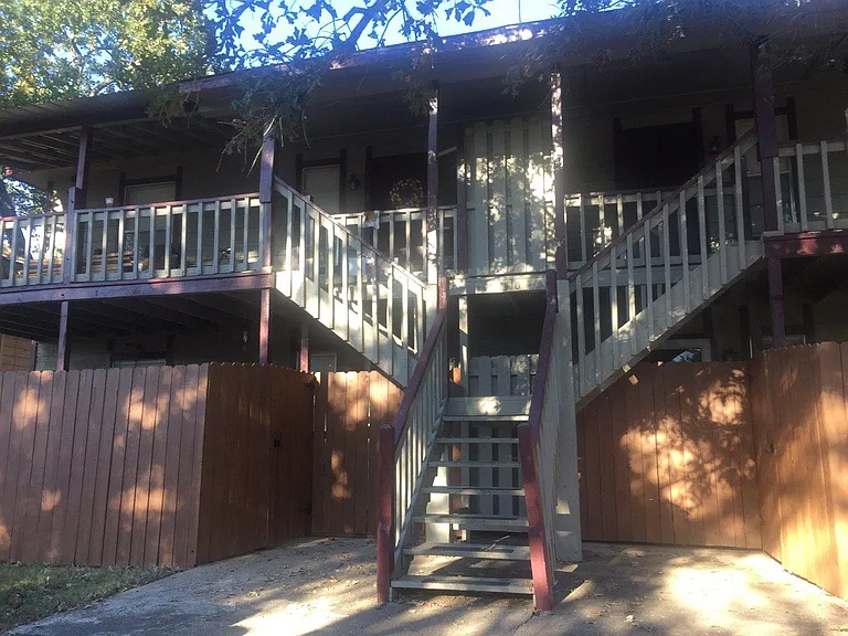 This is the back of the property from the parking area. Your own persona covered balcony deck with a view