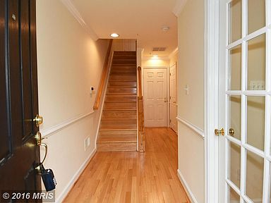 Lower Level Entry with 1-BR, 1-BA, Door to Garage