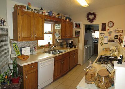 Galley style kitchen with appliances included