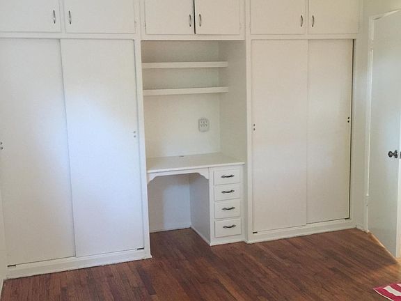 Master Bedroom with a Built-in Desk and more Storage Space above