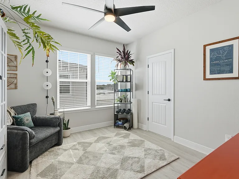 2nd bedroom on 3rd floor with ensuite full bathroom. Could also bee a wellness space or office.