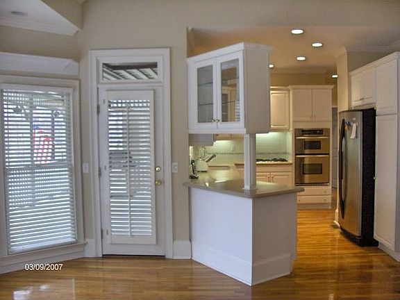 Elegant modern size Kitchen on the main level next to living room and Permanen