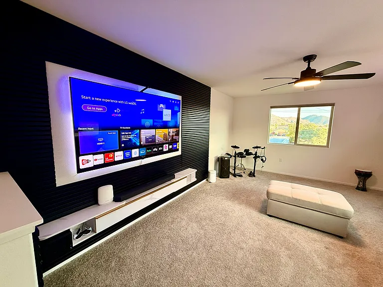 Loft
Celling fan and light pre-installed
Modern LEDs
Floating TV Cabinet
Black wood wall panels
