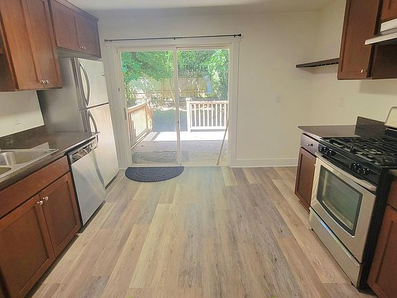 Sliding glass doors lead onto back deck