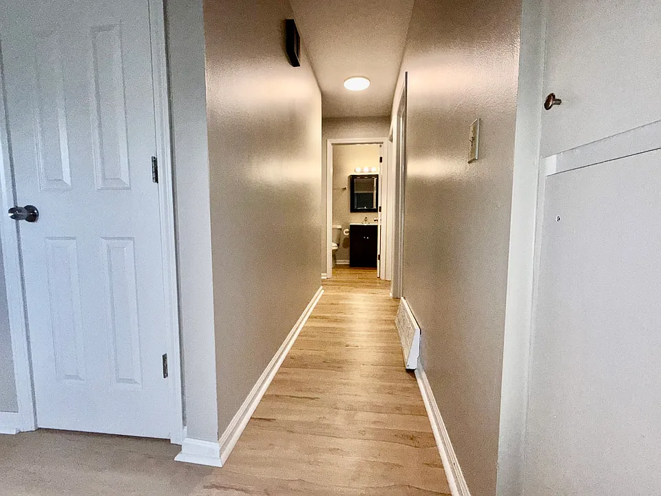Hallway showing off brand new flooring.
