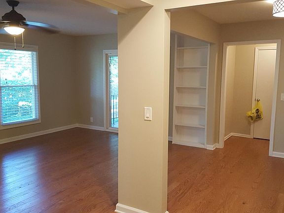Looking from kitchen to dining area on right, living room on