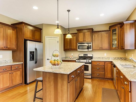 Stainless appliances, large corner pantry and plenty of counter space.