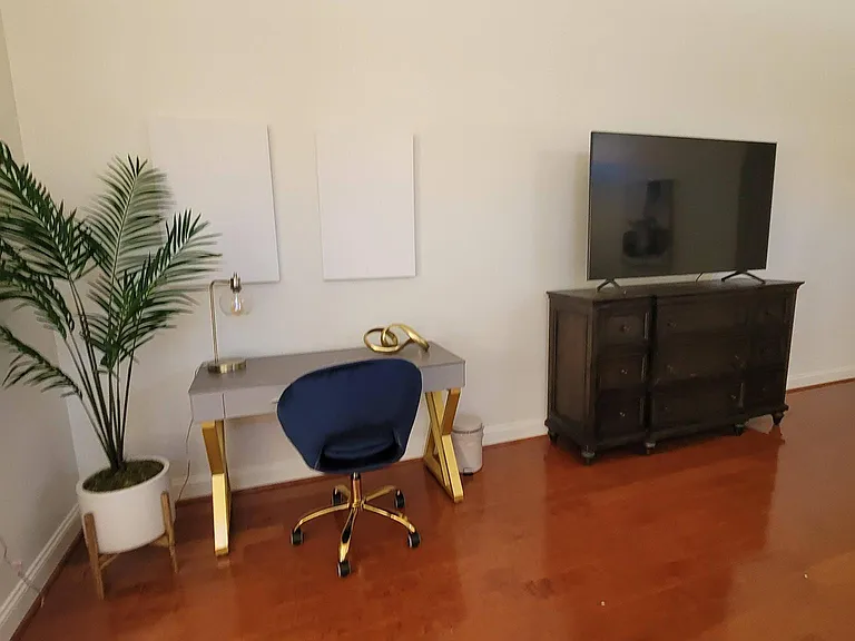 Primary bedroom, very large, includes desk, large TV