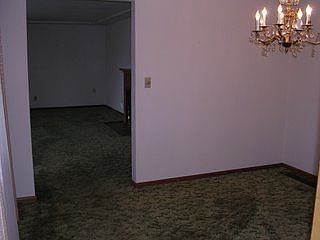 Kitchen thru Formal Dining into Living Room 