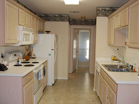 5th image of 5401 Hollytree Dr APT 202