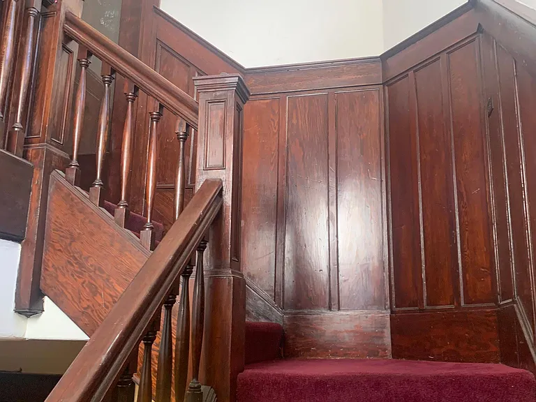 Stairs up to the 3rd floor unit.