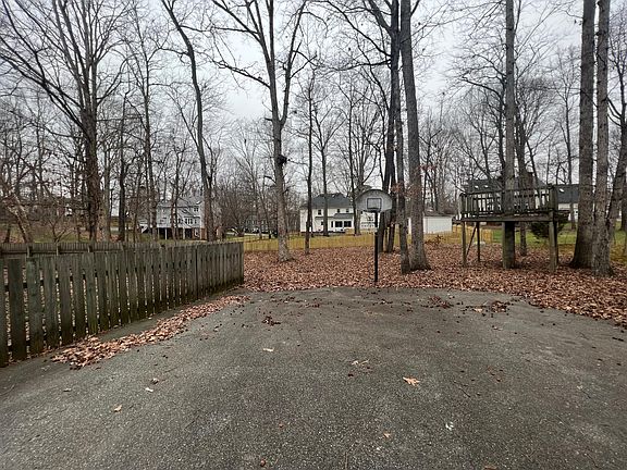 Driveway behind the 2 car garage with plenty of space for parking additional vehicles.