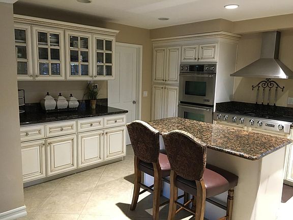 Granite coutertop with built in china cabinet