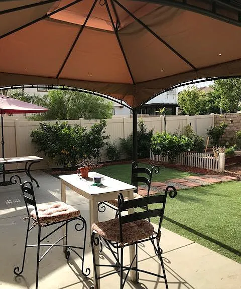 Outdoor relaxing Sunbrella shade included in rental
