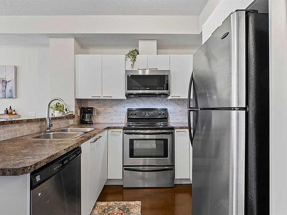 5th image of 2426 W 34th Ave SW #208