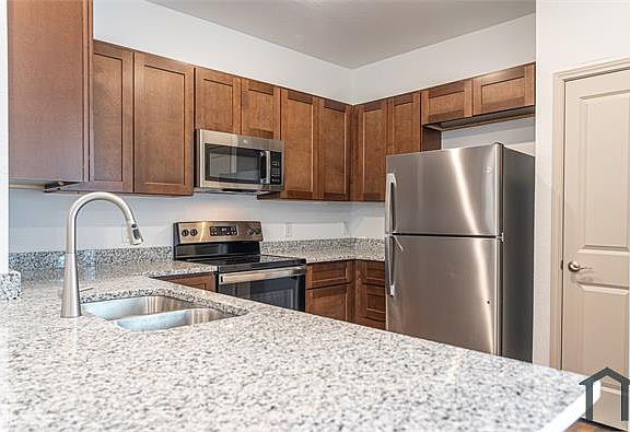 4th image of 7624 Magnolia Village #102