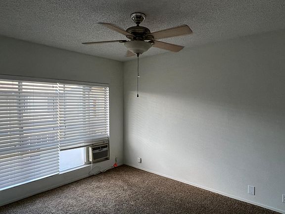 Large master bedroom has its own vanity area and sink, 6 small drawers, Medici ceiling cabinet and 2 closets, plus it_s own A/C