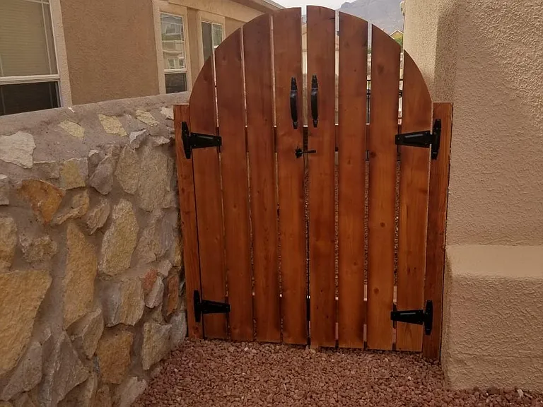 Property features double lockable gates on both sides of the home.