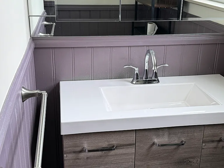 Bathroom vanity and mirror wall