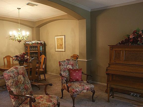 Living room open to the formal dining room.