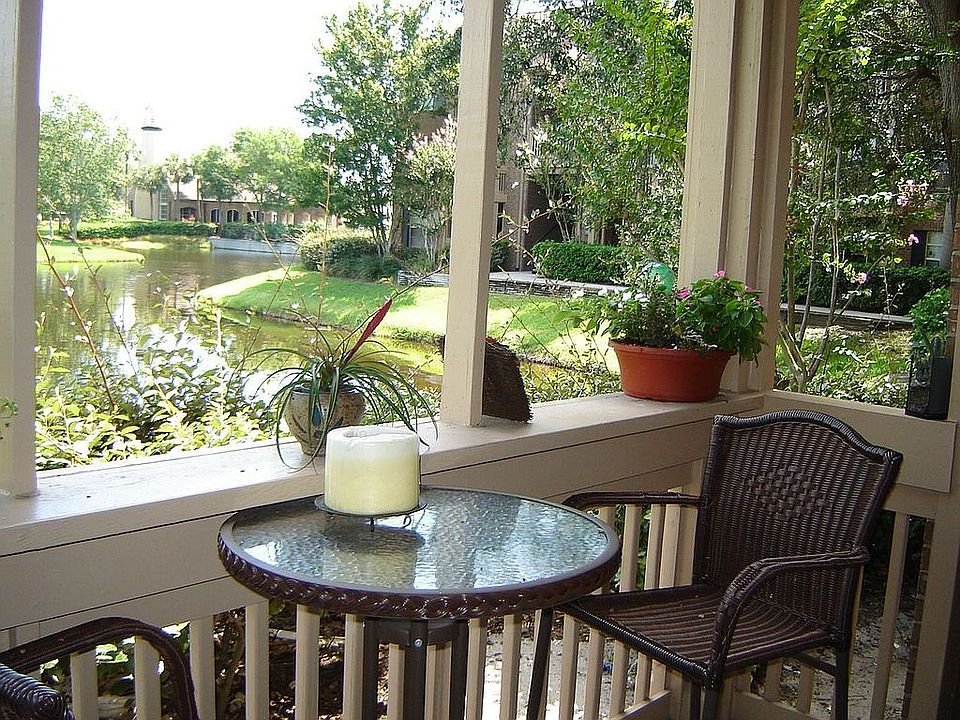 Patio view of lake and lighthouse