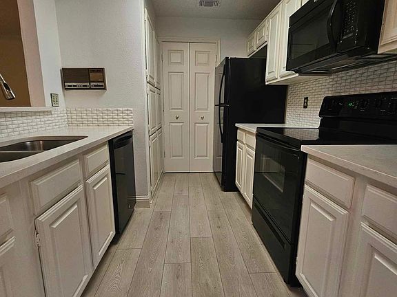 Galley Kitchen - Fridge is included