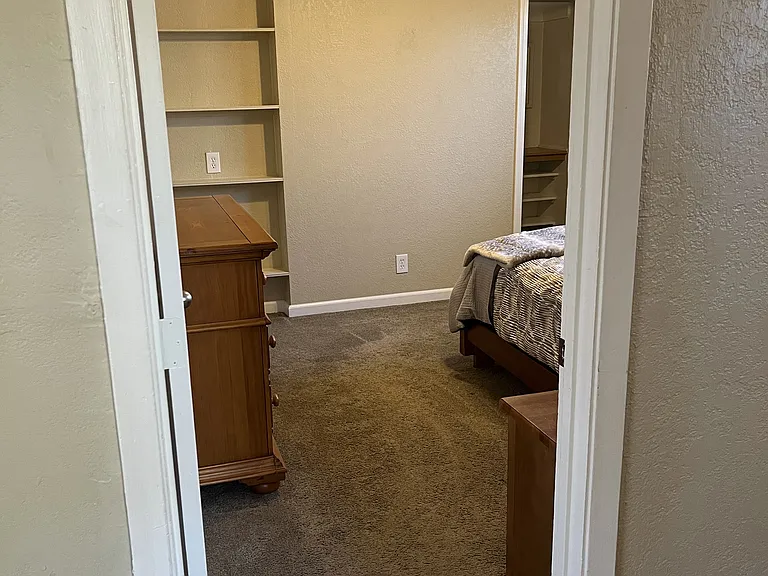 Large master bedroom with oversized walk-in closet