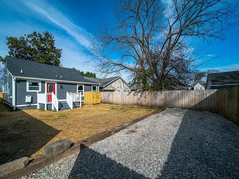 Backyard and parking area.