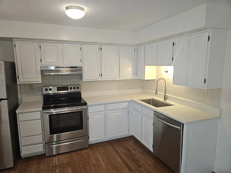Kitchen has open space concept, including new Frigidaire refrigerator (2024), Frigidaire range (2020), Samsung dishwasher (2018), and recent updates including new kitchen sink & counter.