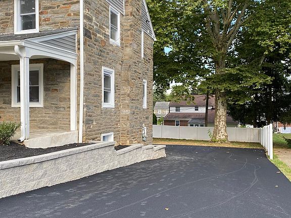 Side and driveway 2 car wide driveway