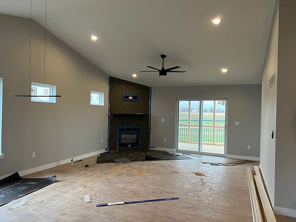 Under construction. Fireplace stone coming soon.