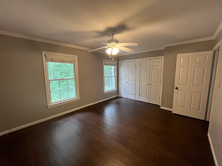 Private upstairs bedroom facing wooded area behind the townhouse
