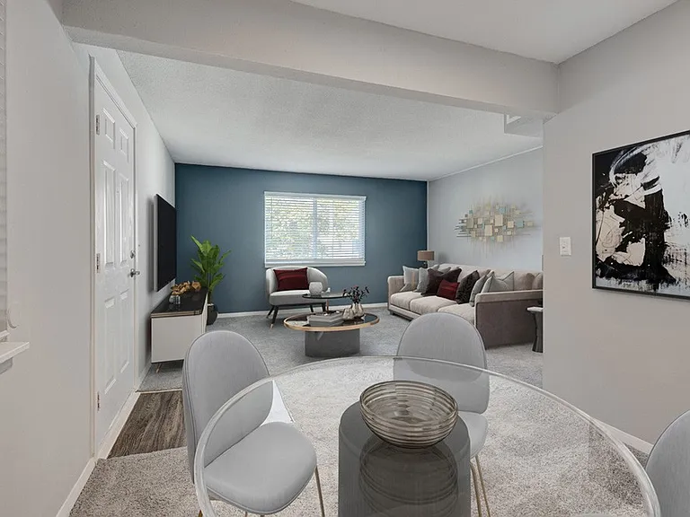 Step into a stylish retreat at Crossings @ 501 Apartments. This beautifully designed living space features modern decor, ample light, and a cozy atmosphere perfect for relaxation or entertaining. Explore your new home today!