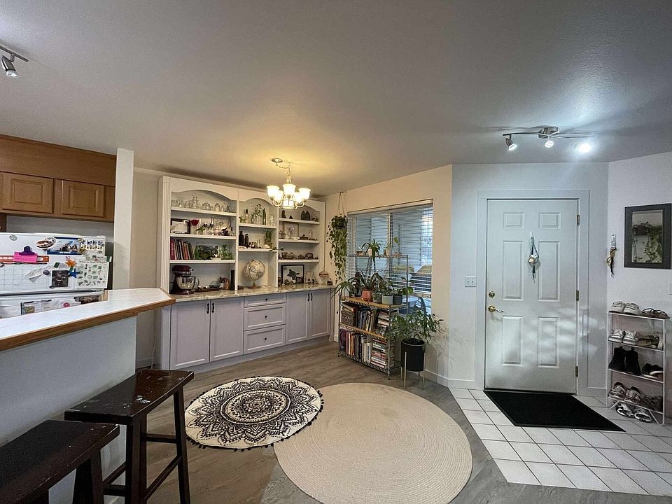 Dining area, great for a small dining table. Hutch is permanent. Bar seating.