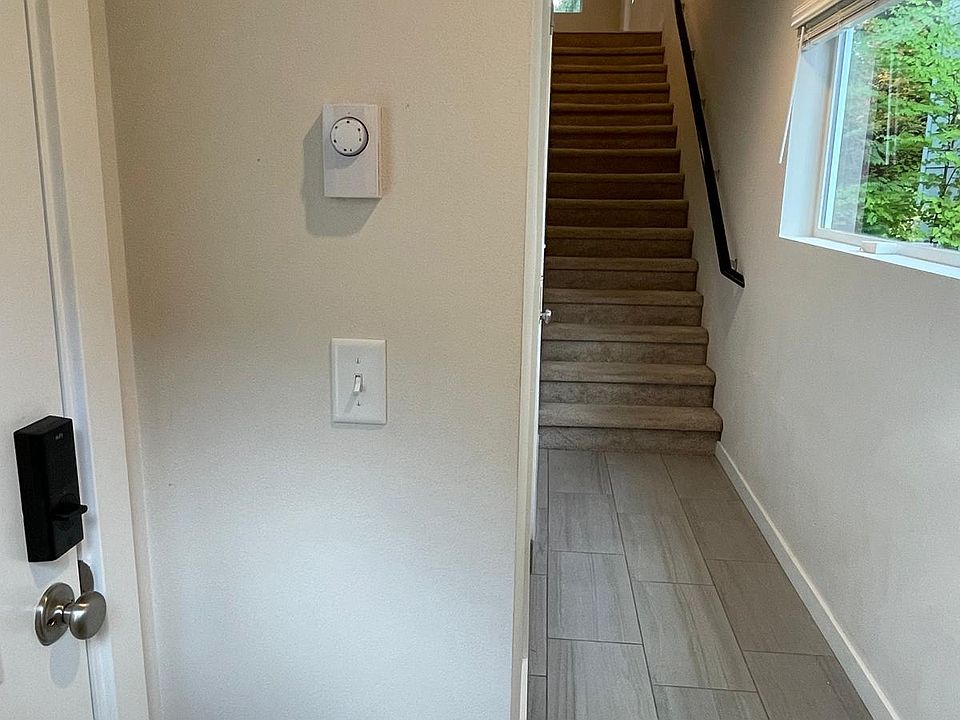 hallway, stairs leading to 2nd floor