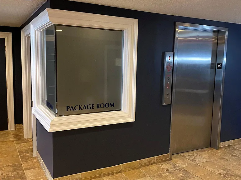 Secure, key fobbed package room