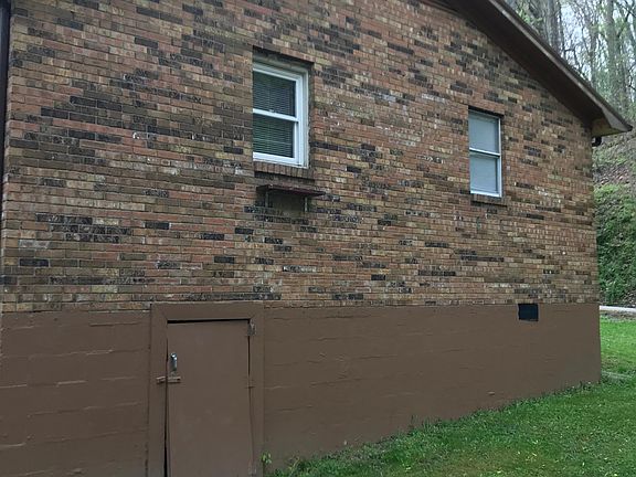 Side of house. Storage area under house available.