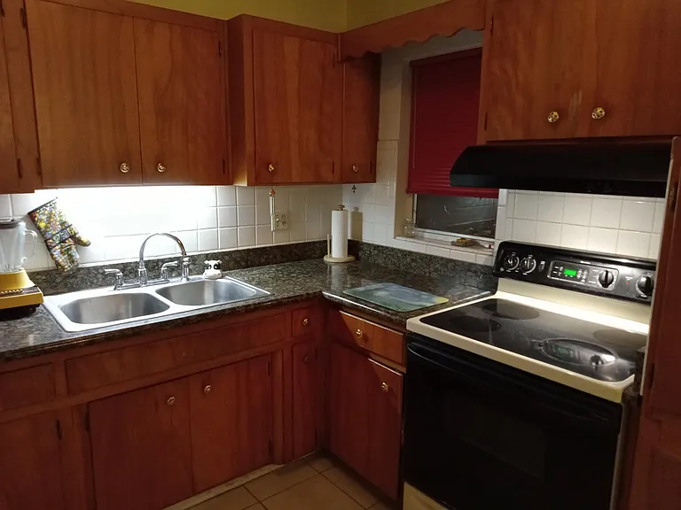 Kitchen, stove, sink and dishwasher and microwave included.
