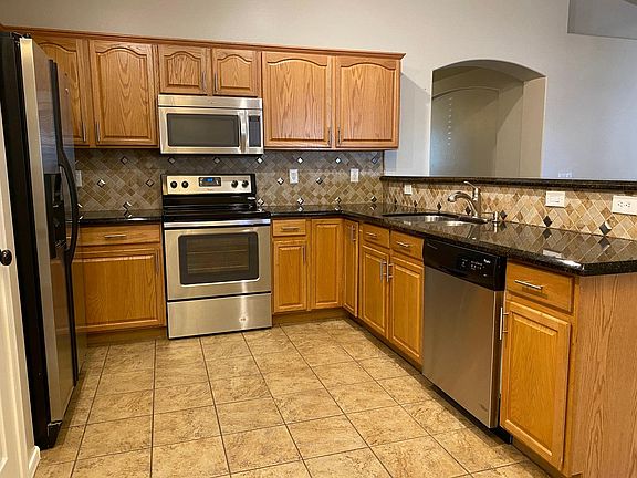 Open Kitchen--includes refrigerator & pantry