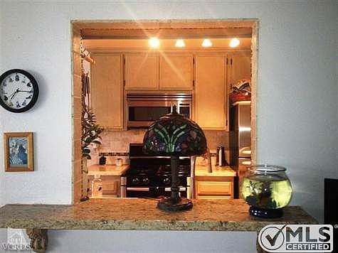 Beautiful Granite bar leads to family.