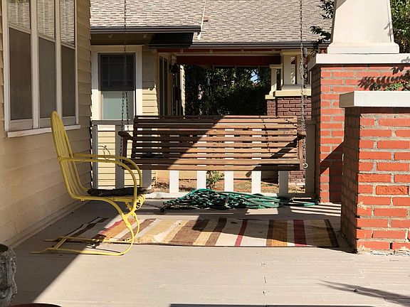 A Porch Swing on a Historic Front Porch Home in a Porch Swing Community.