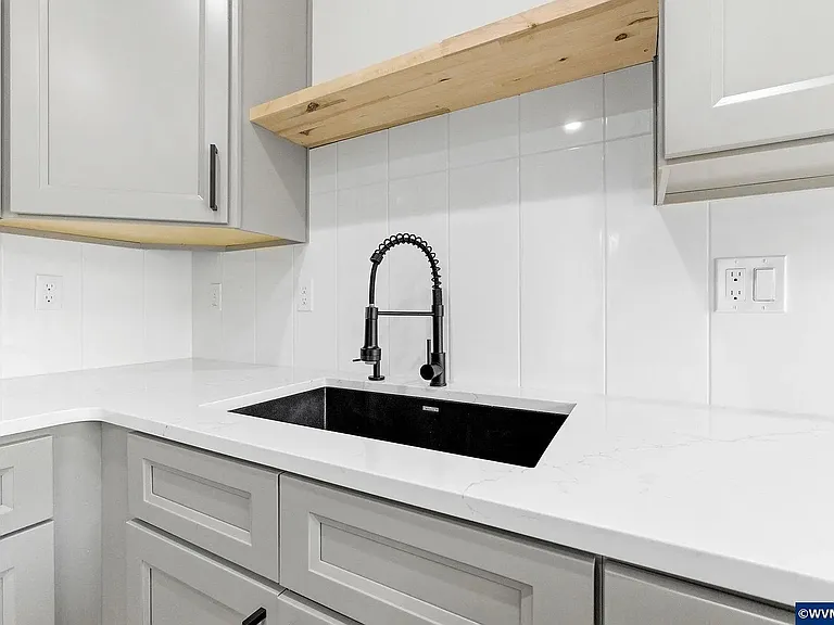 4845 Elvira Pl N — Photo 28
