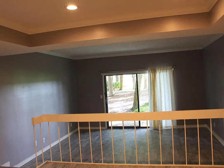 Sunken family room with exit to rear patio