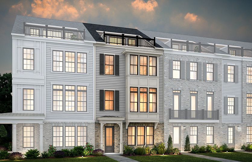 Bainbridge Exterior 27 features James Hardie TM siding, covered front door, brick, terrace and 2 ca