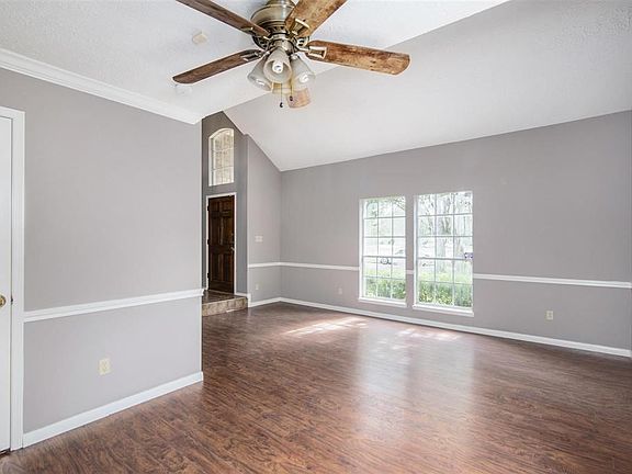 Dining opens to the formal living room.