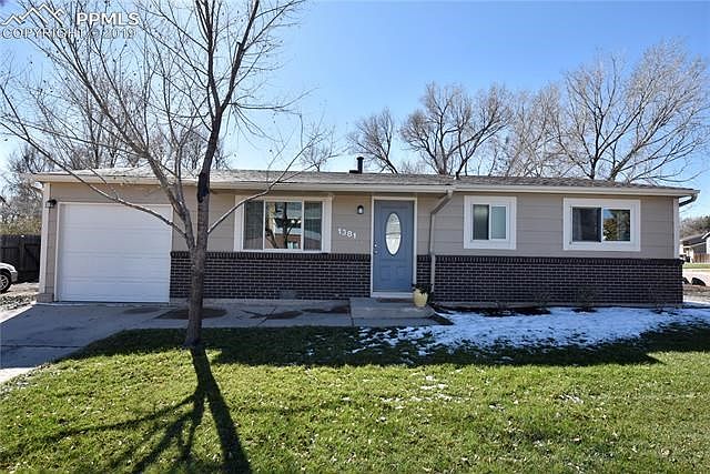 front with beautiful sod landscaping