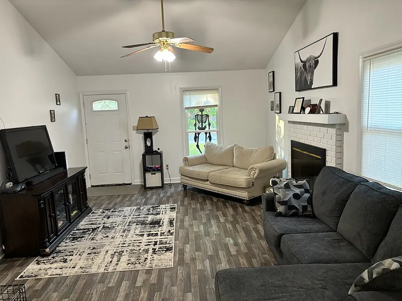 Cathedral ceiling in the living room with LVP flooring - 202 River Hill Dr