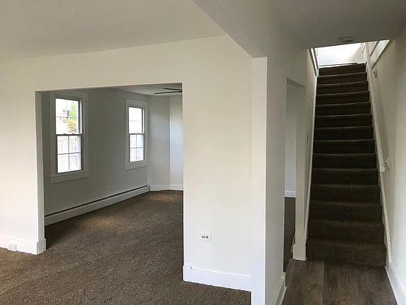 living dining room combination- open concept and staircase upstairs